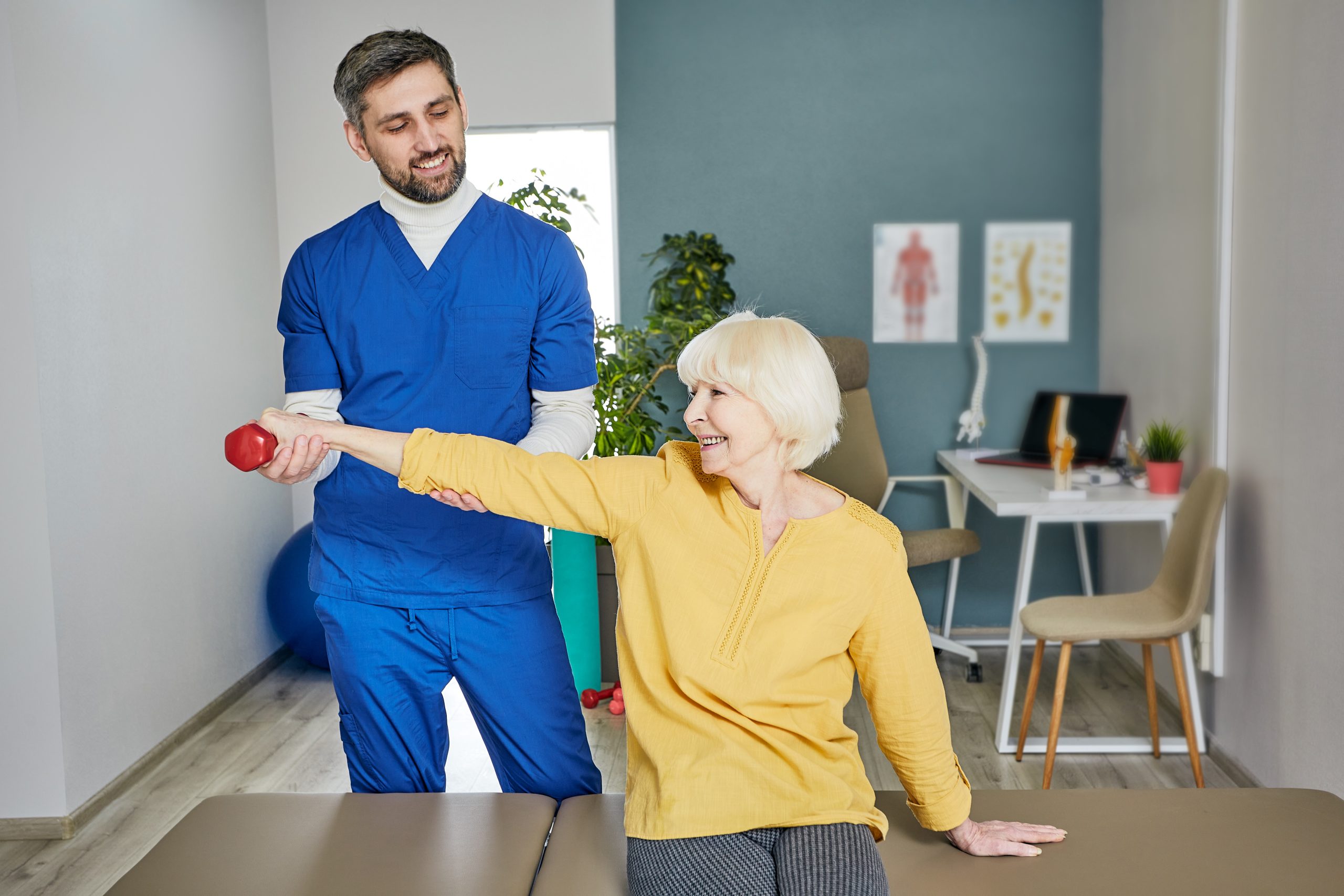 Physiotherapy Services Calgary — clinician discussing assessment with a patient