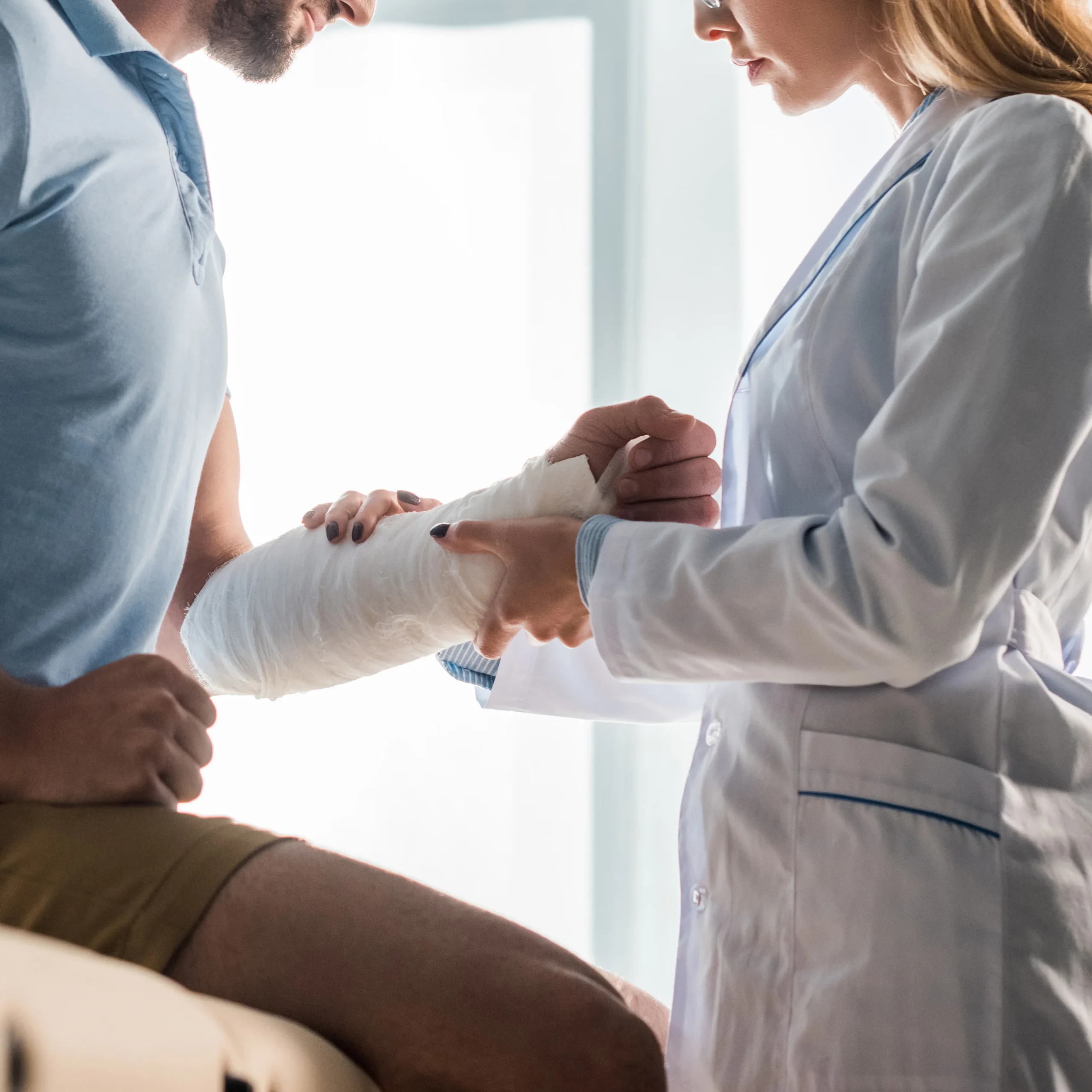 Workplace Injuries Physiotherapy in Calgary assessment with physiotherapist evaluating an injured worker