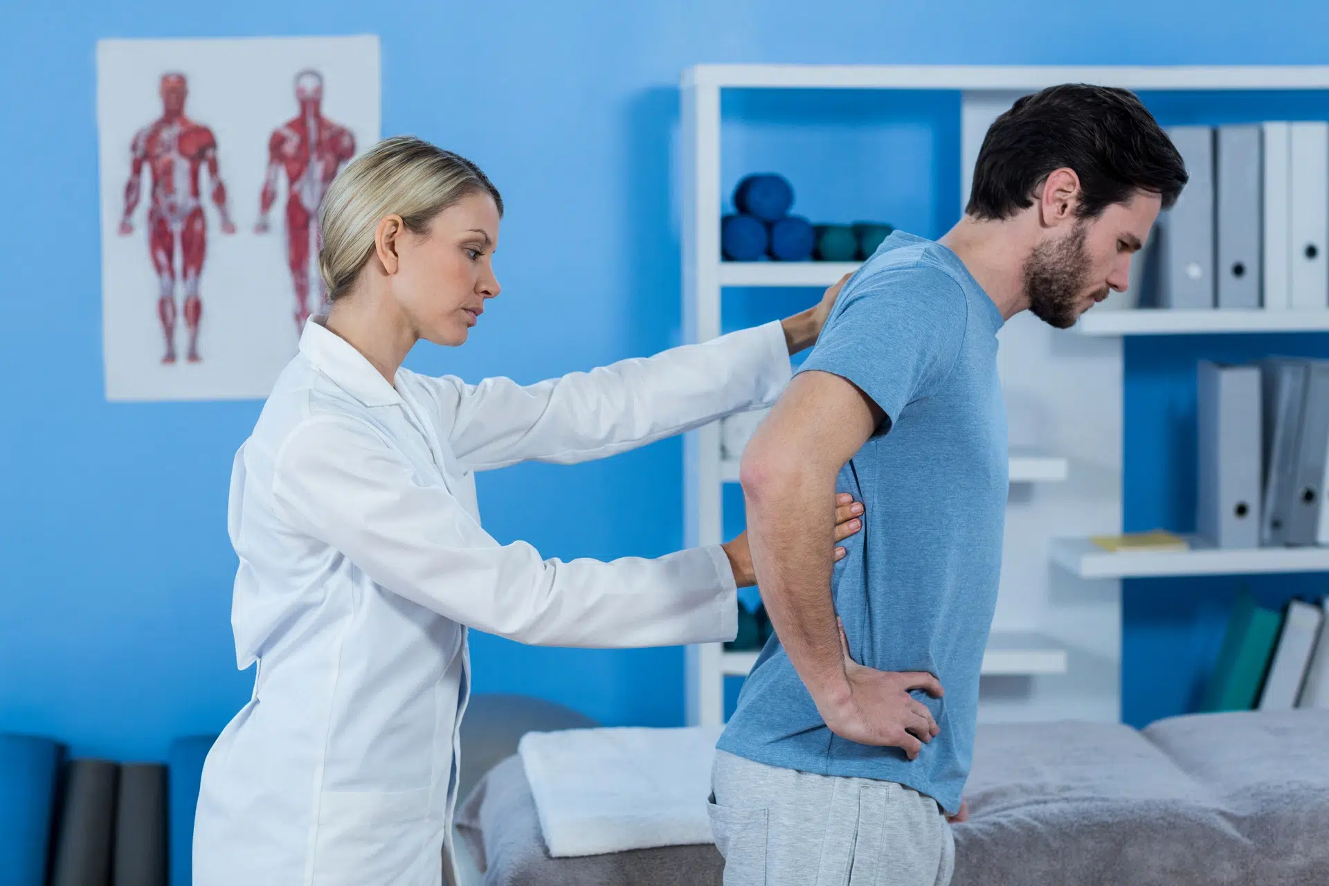 Back Pain and Sciatica Physiotherapy Calgary helping a patient manage lower back and leg pain at Apollo Physiotherapy